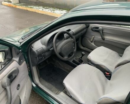 Зелений Опель Корса, об'ємом двигуна 1.2 л та пробігом 228 тис. км за 1500 $, фото 9 на Automoto.ua