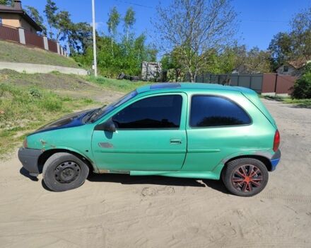 Зеленый Опель Корса, объемом двигателя 1 л и пробегом 289 тыс. км за 700 $, фото 1 на Automoto.ua