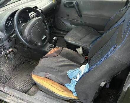 Зеленый Опель Корса, объемом двигателя 1.4 л и пробегом 27 тыс. км за 359 $, фото 6 на Automoto.ua