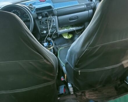 Зелений Опель Корса, об'ємом двигуна 1.2 л та пробігом 300 тис. км за 831 $, фото 1 на Automoto.ua