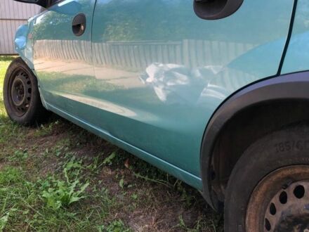 Зеленый Опель Корса, объемом двигателя 1 л и пробегом 180 тыс. км за 900 $, фото 1 на Automoto.ua