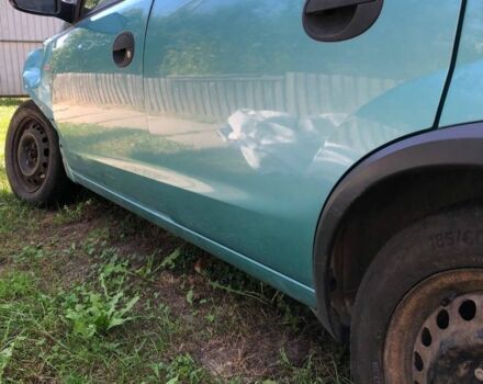 Зелений Опель Корса, об'ємом двигуна 1 л та пробігом 180 тис. км за 900 $, фото 1 на Automoto.ua