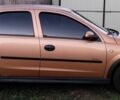Оранжевый Опель Корса, объемом двигателя 1.2 л и пробегом 300 тыс. км за 3000 $, фото 1 на Automoto.ua