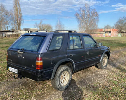 Черный Опель Фронтера, объемом двигателя 2.3 л и пробегом 287 тыс. км за 2750 $, фото 2 на Automoto.ua