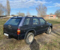 Черный Опель Фронтера, объемом двигателя 2.3 л и пробегом 287 тыс. км за 2750 $, фото 2 на Automoto.ua