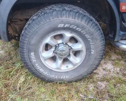 Черный Опель Фронтера, объемом двигателя 2.4 л и пробегом 319 тыс. км за 4300 $, фото 4 на Automoto.ua