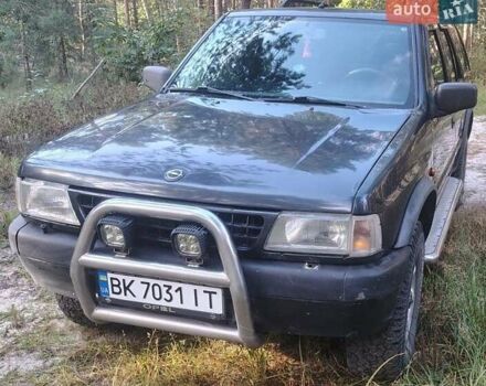 Черный Опель Фронтера, объемом двигателя 2.4 л и пробегом 319 тыс. км за 4300 $, фото 7 на Automoto.ua