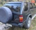 Черный Опель Фронтера, объемом двигателя 2.4 л и пробегом 319 тыс. км за 4800 $, фото 1 на Automoto.ua