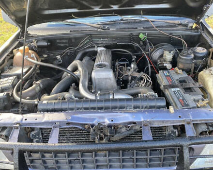 Черный Опель Фронтера, объемом двигателя 2.3 л и пробегом 287 тыс. км за 2750 $, фото 21 на Automoto.ua