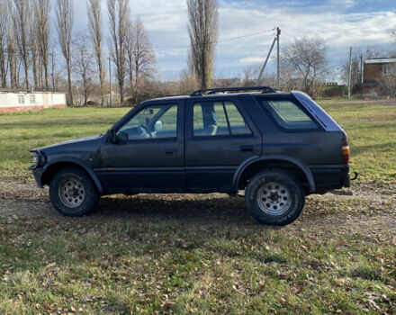 Черный Опель Фронтера, объемом двигателя 2.3 л и пробегом 287 тыс. км за 2750 $, фото 5 на Automoto.ua