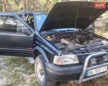 Черный Опель Фронтера, объемом двигателя 2.4 л и пробегом 319 тыс. км за 4300 $, фото 3 на Automoto.ua