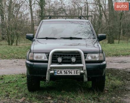 Черный Опель Фронтера, объемом двигателя 2.3 л и пробегом 505 тыс. км за 3700 $, фото 1 на Automoto.ua