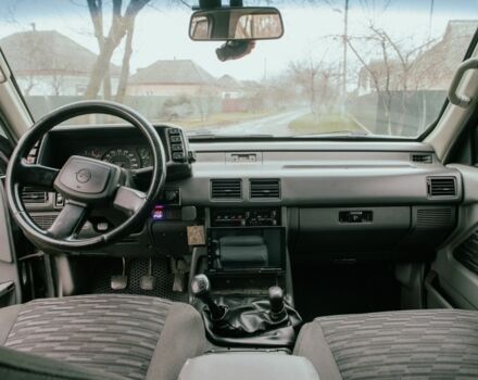 Черный Опель Фронтера, объемом двигателя 2.3 л и пробегом 505 тыс. км за 3700 $, фото 4 на Automoto.ua