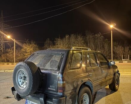 Черный Опель Фронтера, объемом двигателя 2.3 л и пробегом 300 тыс. км за 2600 $, фото 3 на Automoto.ua