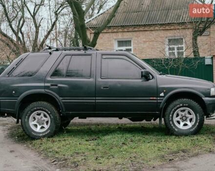 Черный Опель Фронтера, объемом двигателя 2.3 л и пробегом 505 тыс. км за 3700 $, фото 3 на Automoto.ua