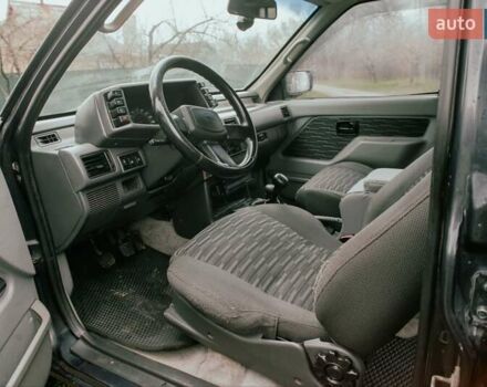Черный Опель Фронтера, объемом двигателя 2.3 л и пробегом 505 тыс. км за 3700 $, фото 8 на Automoto.ua
