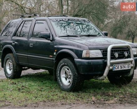 Черный Опель Фронтера, объемом двигателя 2.3 л и пробегом 505 тыс. км за 3700 $, фото 2 на Automoto.ua