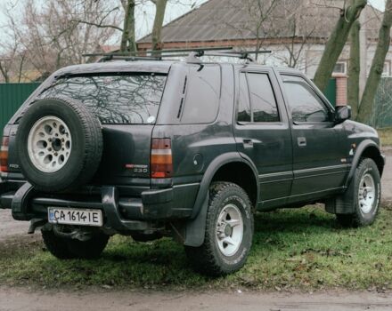 Черный Опель Фронтера, объемом двигателя 2.3 л и пробегом 505 тыс. км за 3700 $, фото 2 на Automoto.ua