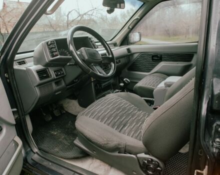 Черный Опель Фронтера, объемом двигателя 2.3 л и пробегом 505 тыс. км за 3700 $, фото 7 на Automoto.ua