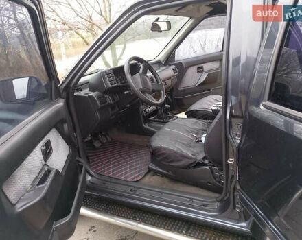 Черный Опель Фронтера, объемом двигателя 2.2 л и пробегом 329 тыс. км за 4999 $, фото 7 на Automoto.ua