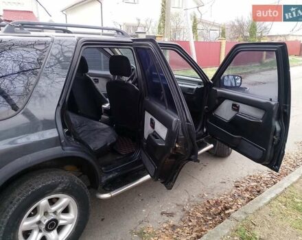 Черный Опель Фронтера, объемом двигателя 2.2 л и пробегом 329 тыс. км за 4999 $, фото 4 на Automoto.ua