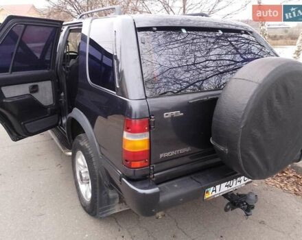 Черный Опель Фронтера, объемом двигателя 2.2 л и пробегом 329 тыс. км за 4999 $, фото 2 на Automoto.ua