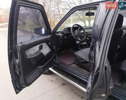 Черный Опель Фронтера, объемом двигателя 2.2 л и пробегом 329 тыс. км за 4999 $, фото 12 на Automoto.ua