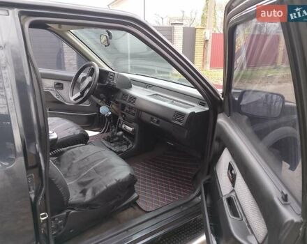 Черный Опель Фронтера, объемом двигателя 2.2 л и пробегом 329 тыс. км за 4999 $, фото 16 на Automoto.ua