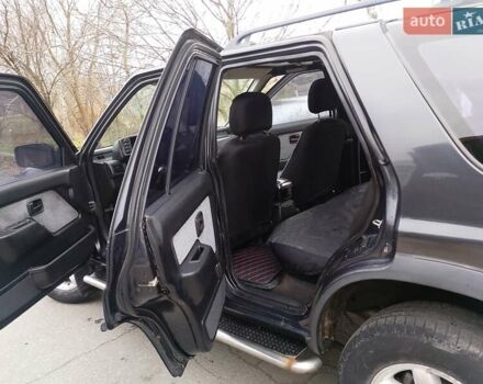 Черный Опель Фронтера, объемом двигателя 2.2 л и пробегом 329 тыс. км за 4999 $, фото 5 на Automoto.ua