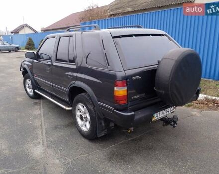 Черный Опель Фронтера, объемом двигателя 2.2 л и пробегом 329 тыс. км за 4999 $, фото 31 на Automoto.ua