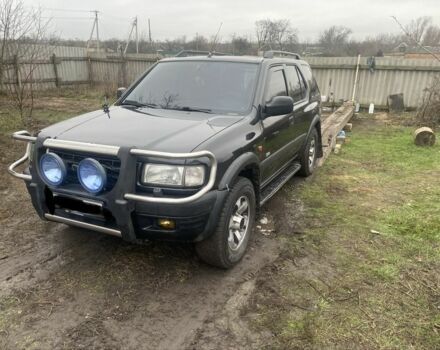 Черный Опель Фронтера, объемом двигателя 2.2 л и пробегом 300 тыс. км за 4100 $, фото 1 на Automoto.ua