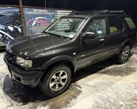 Черный Опель Фронтера, объемом двигателя 2.2 л и пробегом 358 тыс. км за 2500 $, фото 1 на Automoto.ua
