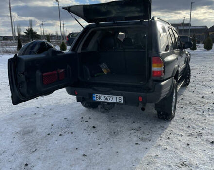 Черный Опель Фронтера, объемом двигателя 2.2 л и пробегом 300 тыс. км за 7300 $, фото 9 на Automoto.ua