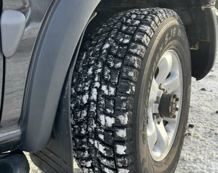 Черный Опель Фронтера, объемом двигателя 2.2 л и пробегом 300 тыс. км за 7300 $, фото 2 на Automoto.ua