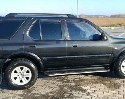 Черный Опель Фронтера, объемом двигателя 2.17 л и пробегом 335 тыс. км за 4800 $, фото 1 на Automoto.ua