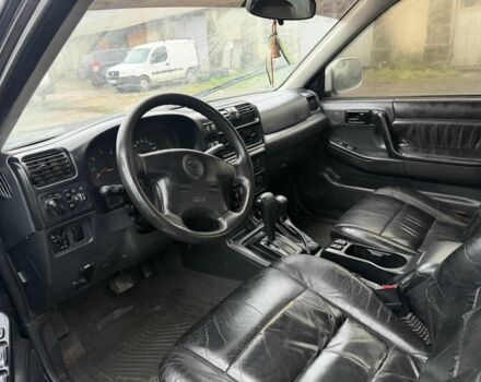 Черный Опель Фронтера, объемом двигателя 2.2 л и пробегом 276 тыс. км за 3500 $, фото 6 на Automoto.ua