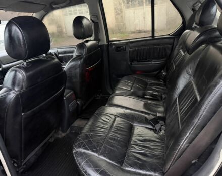 Черный Опель Фронтера, объемом двигателя 2.2 л и пробегом 276 тыс. км за 3500 $, фото 7 на Automoto.ua