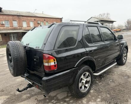 Черный Опель Фронтера, объемом двигателя 2.2 л и пробегом 276 тыс. км за 3500 $, фото 1 на Automoto.ua