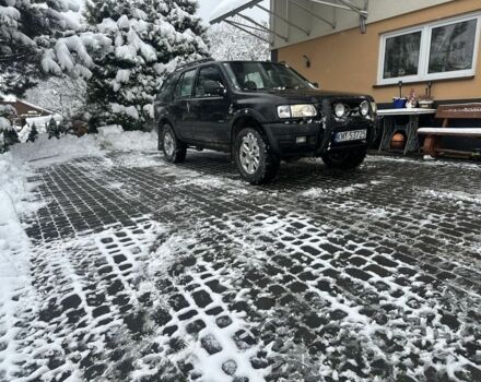 Черный Опель Фронтера, объемом двигателя 2.2 л и пробегом 280 тыс. км за 2750 $, фото 6 на Automoto.ua