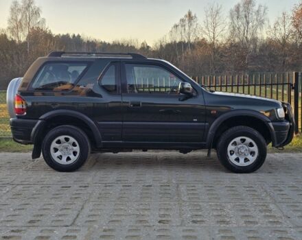 Чорний Опель Фронтера, об'ємом двигуна 2.2 л та пробігом 277 тис. км за 2000 $, фото 4 на Automoto.ua