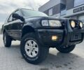 Черный Опель Фронтера, объемом двигателя 2.5 л и пробегом 211 тыс. км за 2200 $, фото 1 на Automoto.ua