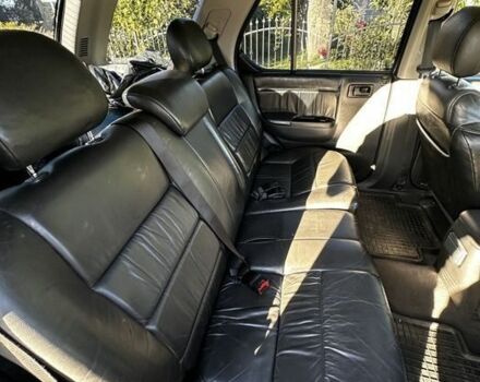 Черный Опель Фронтера, объемом двигателя 2.2 л и пробегом 278 тыс. км за 2200 $, фото 3 на Automoto.ua