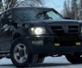 Черный Опель Фронтера, объемом двигателя 2.4 л и пробегом 200 тыс. км за 3800 $, фото 1 на Automoto.ua