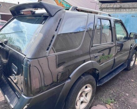 Черный Опель Фронтера, объемом двигателя 2.4 л и пробегом 2 тыс. км за 3000 $, фото 9 на Automoto.ua