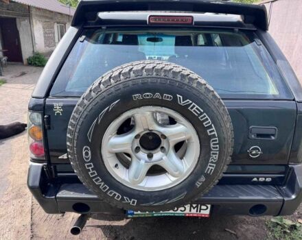 Черный Опель Фронтера, объемом двигателя 2.4 л и пробегом 2 тыс. км за 3000 $, фото 6 на Automoto.ua