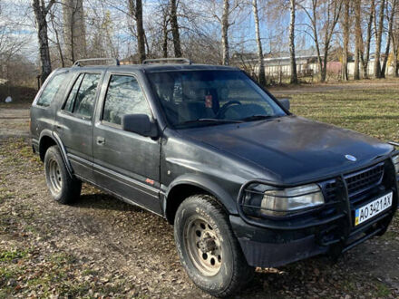 Черный Опель Фронтера, объемом двигателя 2.3 л и пробегом 287 тыс. км за 2750 $, фото 1 на Automoto.ua