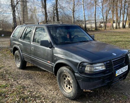 Черный Опель Фронтера, объемом двигателя 2.3 л и пробегом 287 тыс. км за 2750 $, фото 1 на Automoto.ua