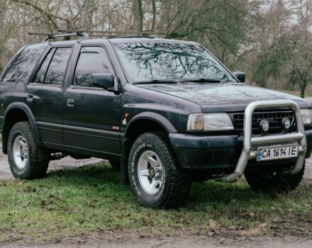 Черный Опель Фронтера, объемом двигателя 2.3 л и пробегом 505 тыс. км за 3700 $, фото 1 на Automoto.ua