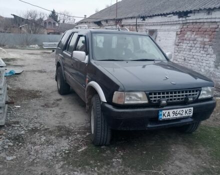 Черный Опель Фронтера, объемом двигателя 2.4 л и пробегом 320 тыс. км за 4500 $, фото 1 на Automoto.ua