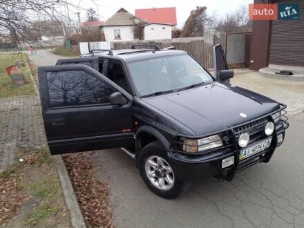 Черный Опель Фронтера, объемом двигателя 2.2 л и пробегом 329 тыс. км за 4999 $, фото 1 на Automoto.ua